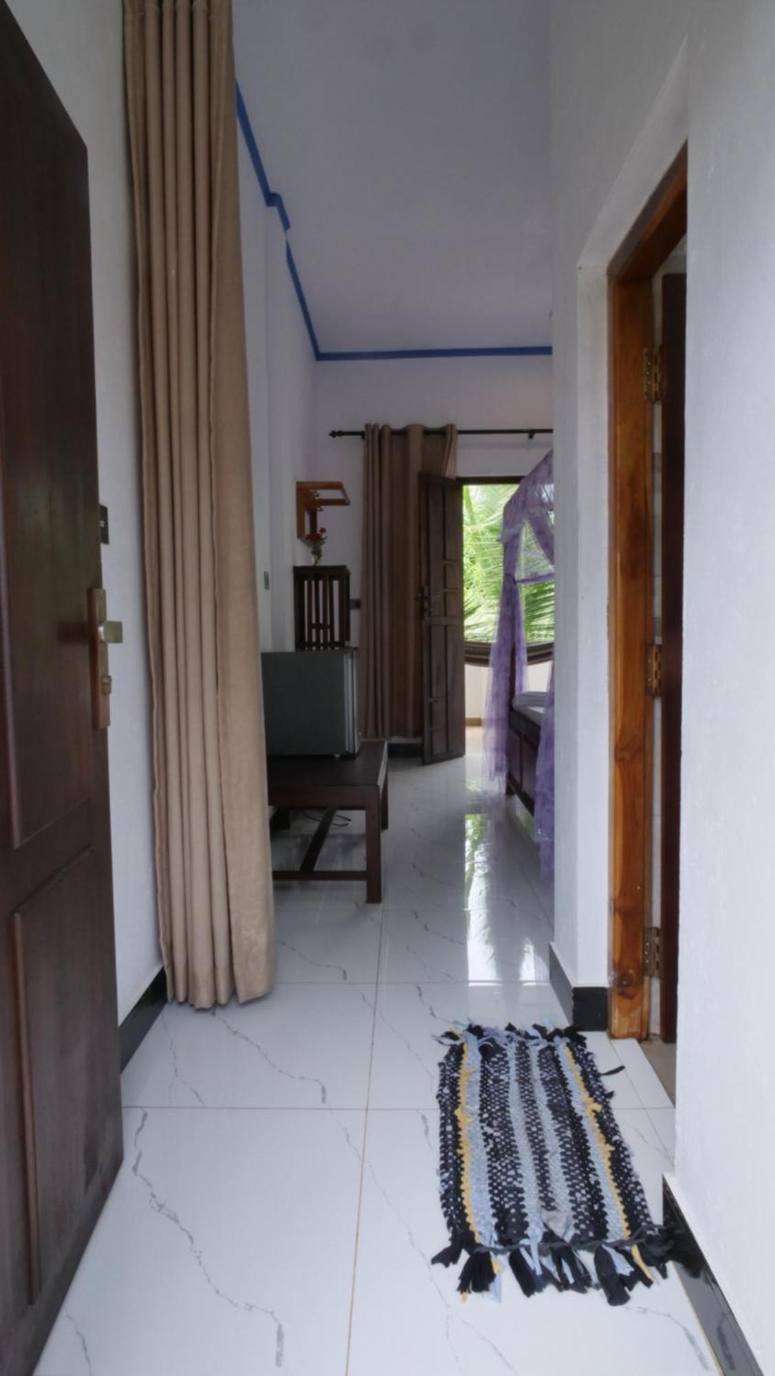 Aqua Blue Hotel อารูกัมเบย์ ภายนอก รูปภาพ