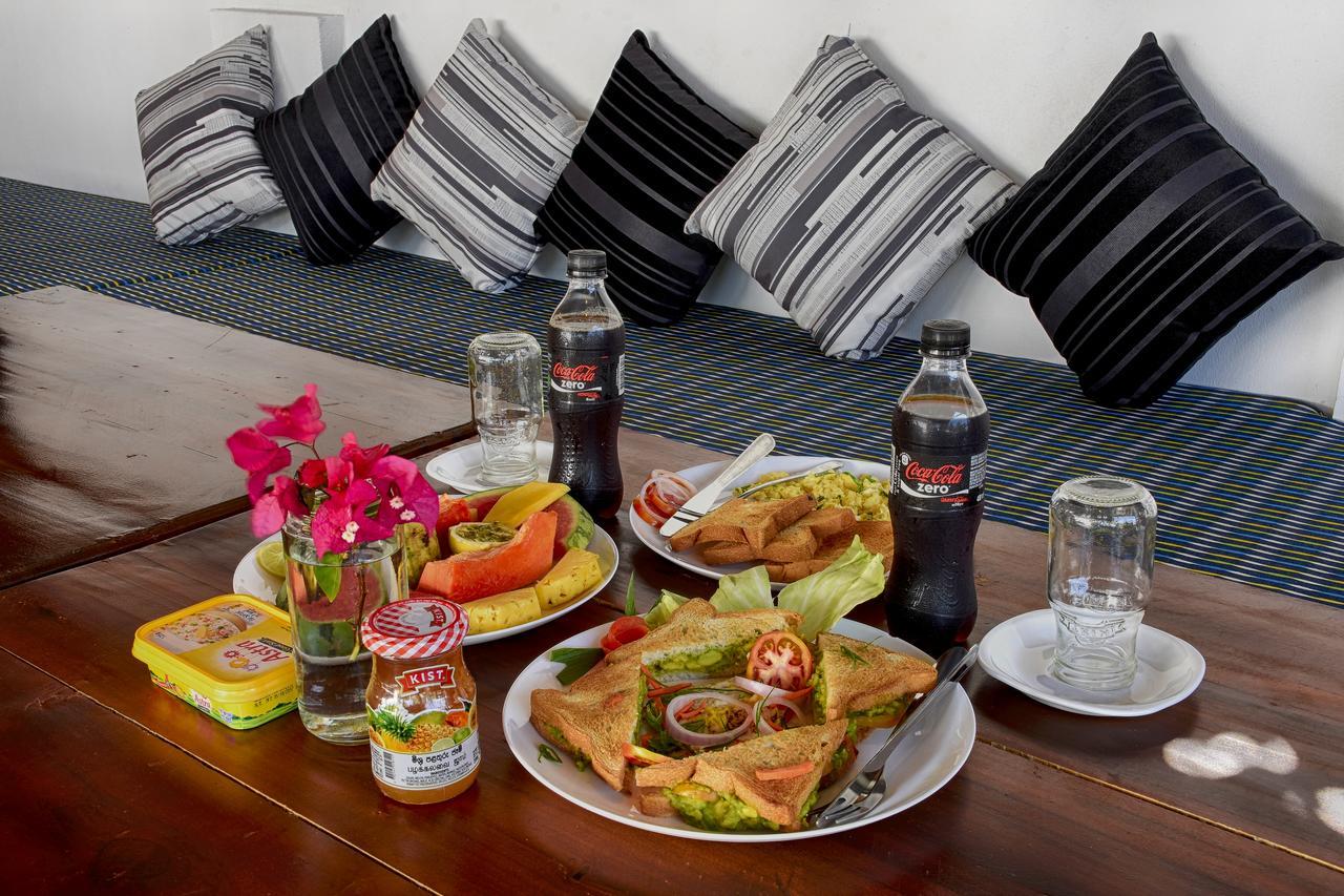 Aqua Blue Hotel อารูกัมเบย์ ภายนอก รูปภาพ